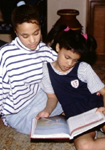 Two girls reading